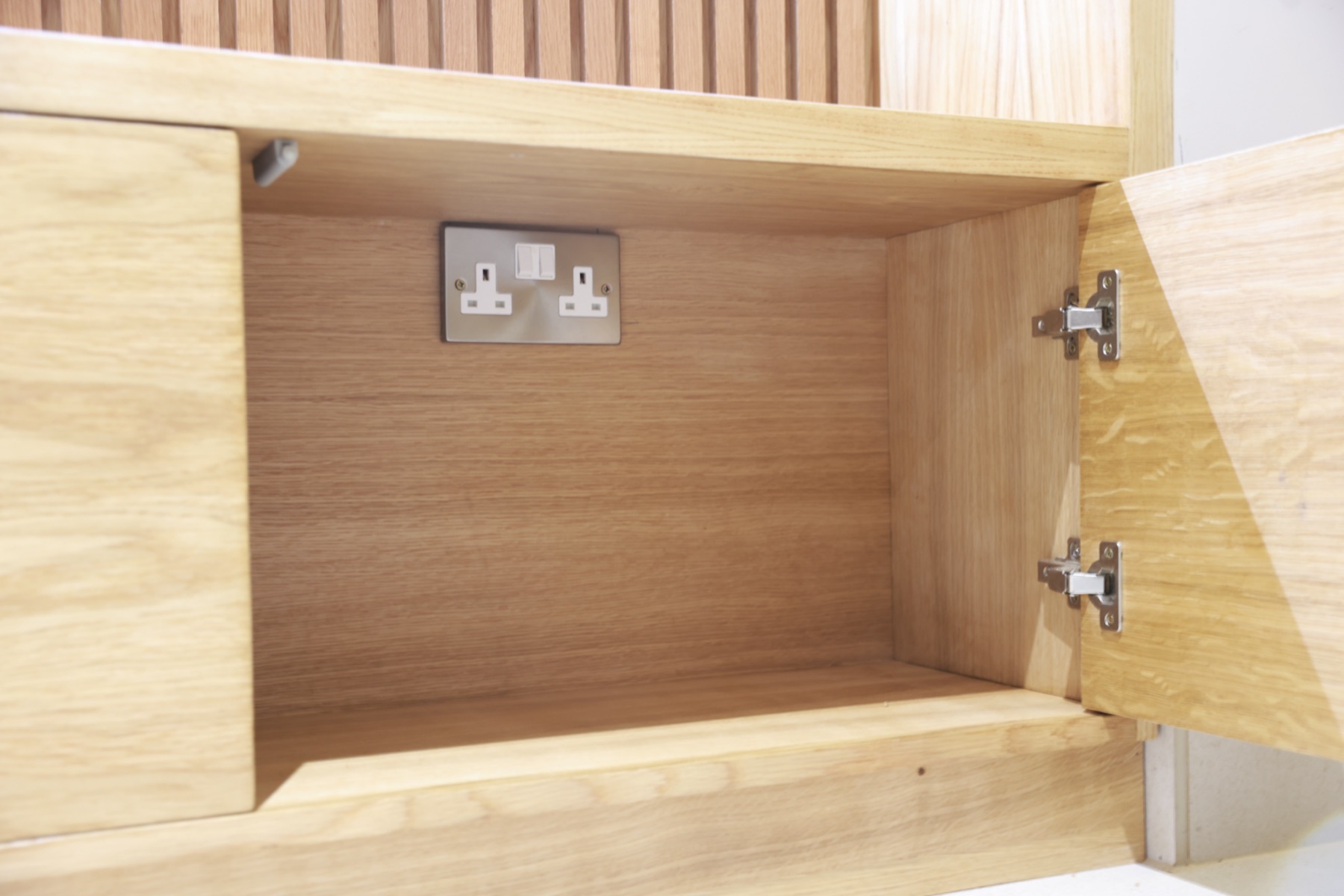 Alcove storage unit with shelves